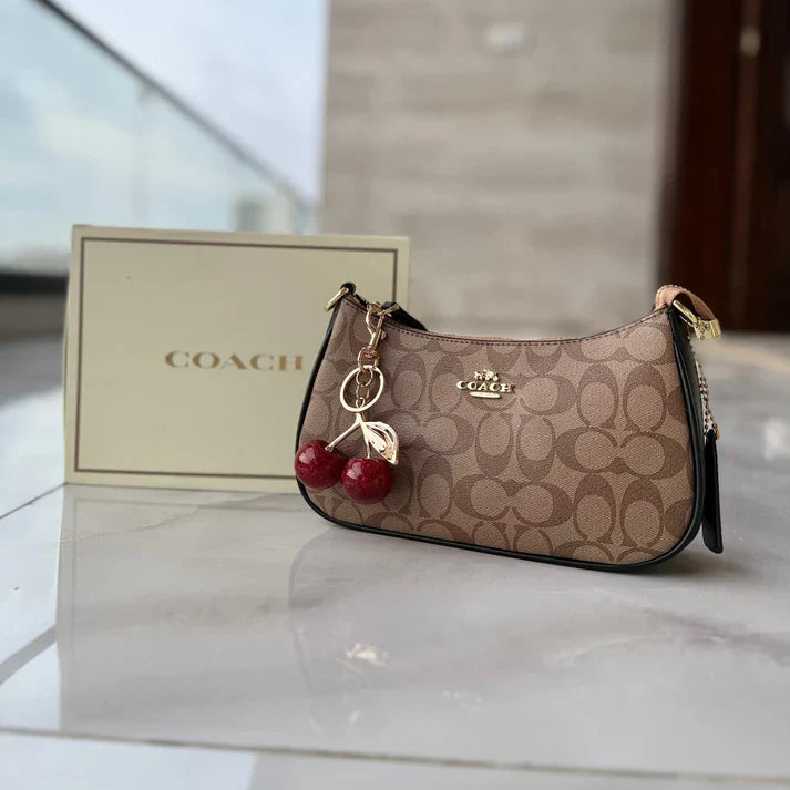 COACH CHERRY CHARM BAG (BROWN)